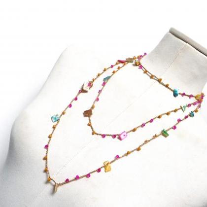 Long Beaded Gold Necklace With Yellow And Pink..